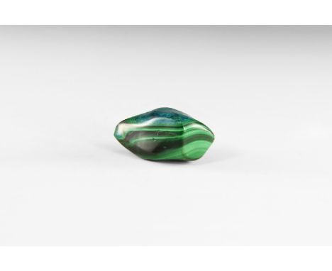 A piece of polished malachite with azurite with lustrous green, blue and black colouring. See Bonewitz, Dr. Ronald Louis, Roc