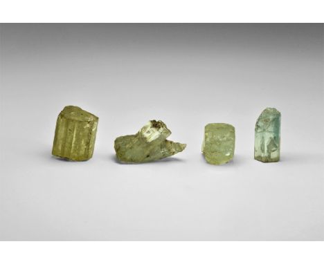 A group of four aquamarine crystals, all terminated, from Brazil, in old white card tray. See Bonewitz, Dr. Ronald Louis, Roc