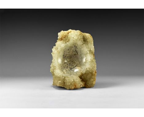 A large sheet of quartz with several porcupine clusters; centre cut and polished to form a bowl. See Bonewitz, Dr. Ronald Lou