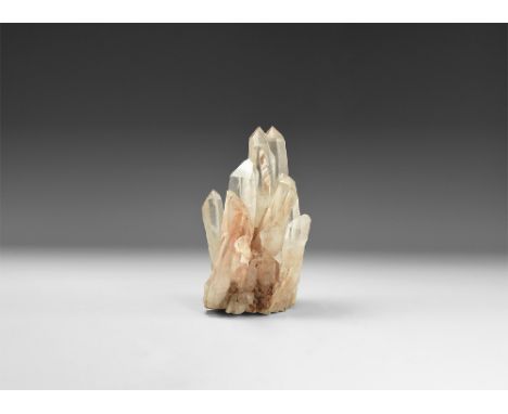A large cluster of needle-shaped quartz crystals with clear colour, rainbow reflections and well formed facets. See Bonewitz,