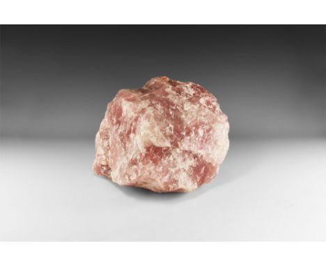 An exceptionally large boulder of rose quartz displaying a rich deep pink colour. See Bonewitz, Dr. Ronald Louis, Rocks & Min