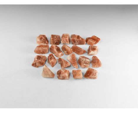 A group of twenty chunks of red calcite with waxy lustre. See Bonewitz, Dr. Ronald Louis, Rocks & Minerals, 2008, p.177. 2.35