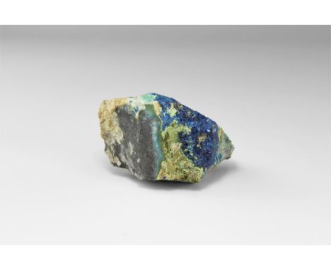 A specimen of the rare minerals cumengite and boleite on matrix, from Boleo, Mexico, in old white card tray with adhesive tap