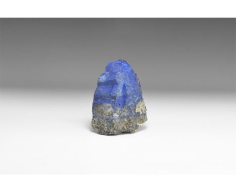 A large piece of very high quality intense blue uncut lapis lazuli with good pyrite layering. See Bonewitz, Dr. Ronald Louis,