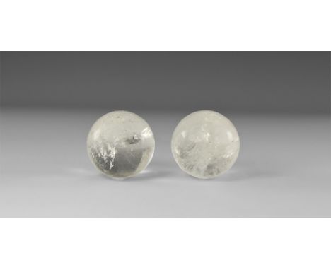 A pair of quartz crystal spheres of a clear colour and with rainbow reflections. See Bonewitz, Dr. Ronald Louis, Rocks & Mine