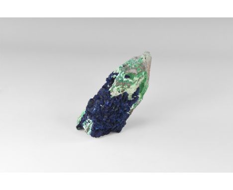 A specimen of finely crystallized azurite with accessory malachite, on a rock groundmass, from Arizona, USA, in old white car