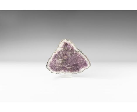 A large amethyst bowl-shaped geode section with well-formed and richly coloured amethyst crystals, some quartz crystal in sec