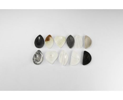 A group of eleven polished and shaped mineral trays including agate, quartz, labradorite, etc. See Bonewitz, Dr. Ronald Louis