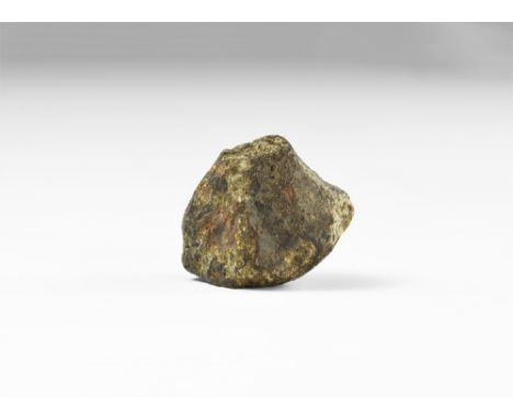 A brown meteorite from an unidentified locality, probably an L-chondrite, based on its relatively light weight and ablation c