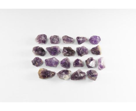 A group of twenty amethyst pieces of a deep purple colour. See Bonewitz, Dr. Ronald Louis, Rocks & Minerals, 2008, p.222-223.