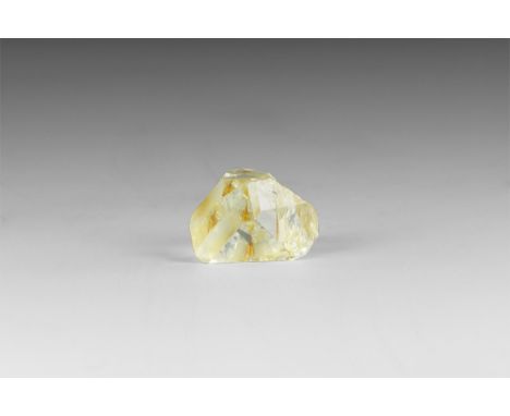 A gem quality topaz crystal of 50 carats with a pale blue colour and well formed facets, in white card tray with Gregory, Bot