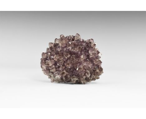 A fine, knob-shaped 'porcupine' of amethyst crystals, from Brazil. See Bonewitz, Dr. Ronald Louis, Rocks & Minerals, 2008, p.