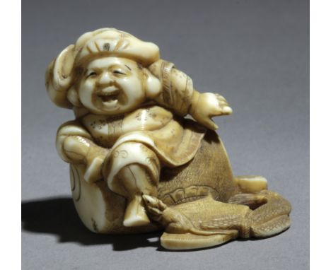 A late 19th century Japanese netsuke from Meiji period. Signed Kogyoko on the base. in carved ivory portraying 'Daikoku' sat 