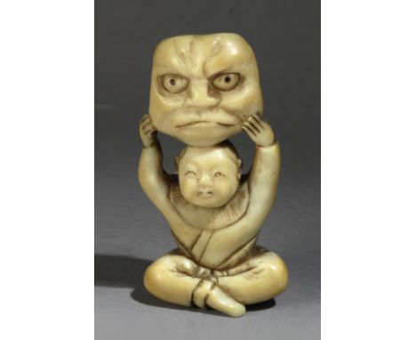 A mid 19th century Japanese netsuke from Meiji period. Signed Otokazu. In carved elephant ivory portraying a child sat on the