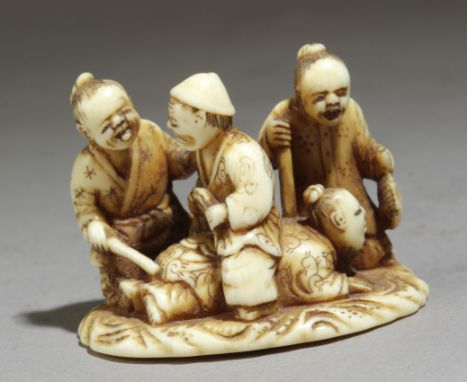 A Japanese netsuke circa 1835-1860 from Edo period. Signed Norishige. In carved elephant ivory portraying a group of four dif