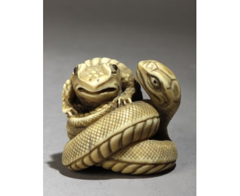 A 20th century Japanese netsuke from Meiji or Showa period. Signed Tadatomo? In carved elephant ivory portraying a snake catc