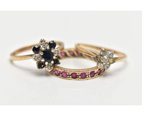 A SELECTION OF THREE RINGS, to include a 9ct yellow gold sapphire and diamond cluster ring, hallmarked London 1982, ring size