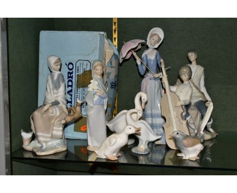 SEVEN LLADRO FIGURINES AND BIRD FIGURES, WITH TWO NAO BIRDS, comprising a boxed New Shepherdess no 4576, sculptor F Garcia, i
