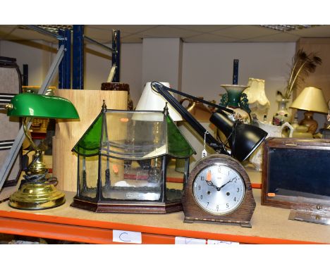 A GROUP OF DESK LAMPS, comprising a brass Banker's Lamp with a green glass shade, a reproduction 'Anglepoise' style black des