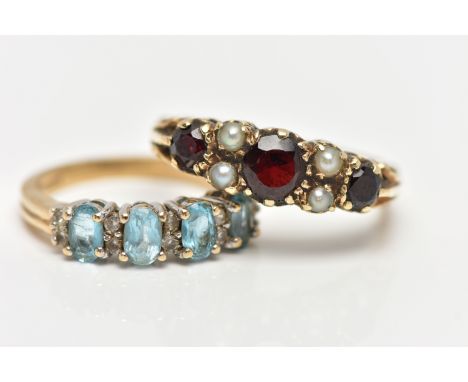 TWO 9CT GOLD GEM SET RINGS, the first a garnet and seed pearl ring, prong set in yellow gold, scrolling detail to the gallery