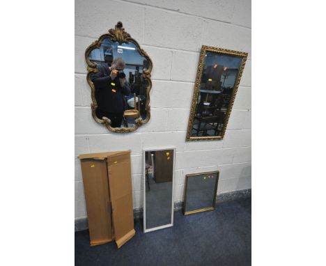 A GILT FRAMED FOLIATE WALL MIRROR, 46cm x 78cm, a rectangular gilt framed bevelled edge wall mirror, another gilt mirror, a w