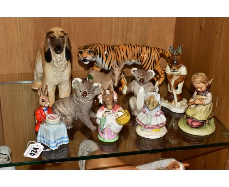 A GROUP OF BESWICK, ROYAL DOULTON AND OTHER ANIMAL AND CHARACTER FIGURES, comprising Royal Doulton 'Happy Birthday Bunnykins'