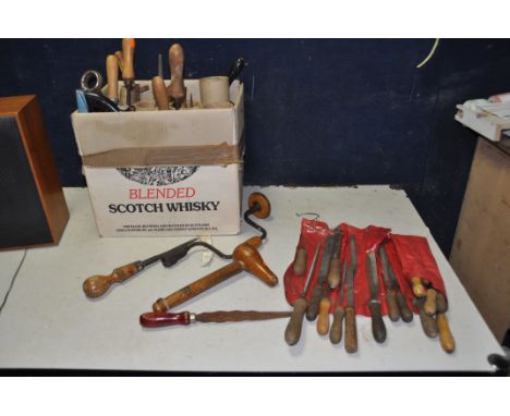 A BOX CONTAINING VINTAGE TOOLS including shoulder brace, a London Screwdriver, files, Surform, hacksaw etc.