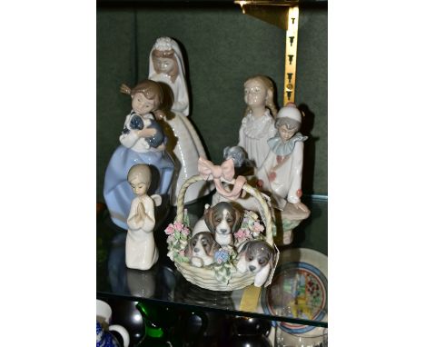 SIX LLADRO AND NAO FIGURES, comprising Lladro 'A Litter of Love' three puppies in a basket, no 1441, sculptor Juan Huerta, in
