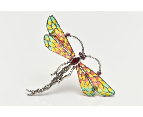 A WHITE METAL PLIQUE A JOUR BROOCH/PENDANT, in the form of a dragonfly, set with ruby eyes and antennas, with a marquise cut 