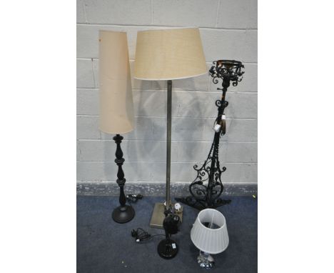 VARIOUS LIGHTING, to include a wrought iron converted oil lamp, an ebonised turned standard lamp with a conical shade, a mode