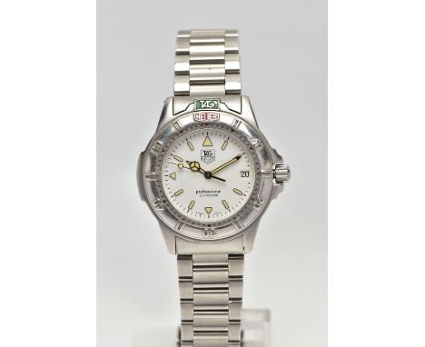 A GENTS 'TAG HEUER' WRISTWATCH, round white dial signed 'Tag Heuer, Professional 200 metres', luminescent baton markers, date