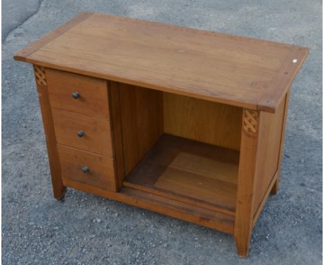 Contemporary oak dressing table with three drawers and a single overhang shelf on square supports. W101cm D50cm H71cm 