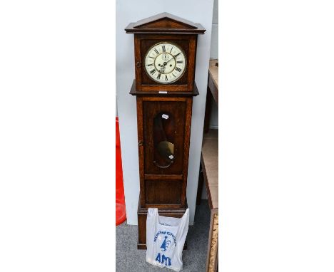 A small oak longcase clock, 7" enamel dial stamped GB for Gustav Becker