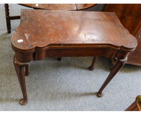 George III walnut fold over card table fitted with a frieze drawer, 82cm by 39cm by 73cmThis is a handsome piece, but very ti