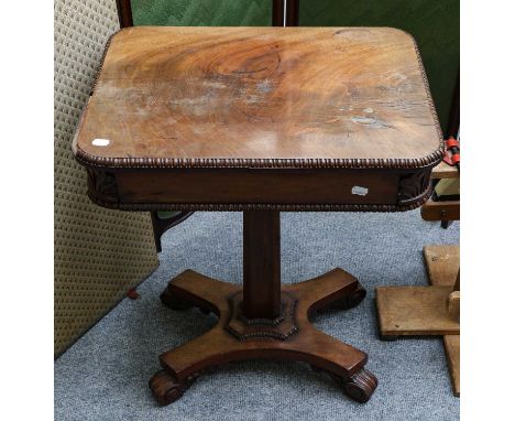 A mid 19th century mahogany pedestal table, fitted with a drawer on a tapered faceted support, raised on an X-form base termi