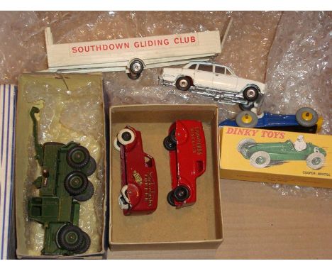 A collection of boxed and unboxed playworn DInky to include a part Gift Set 118, a repro box and a Recovery Tractor in origin