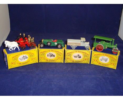 A group of Matchbox Orignal Models of Yesteryear comprising a No. 4 Horse Drawn Fire Engine, a No 5, No 6 and a No 11 VG-E in