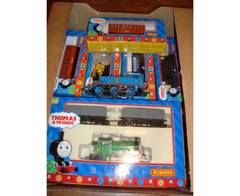 A selection of Hornby Thomas the Tank Engine Series locos and stock to include a Percy and Twin Wagon set, an unboxed Thomas 