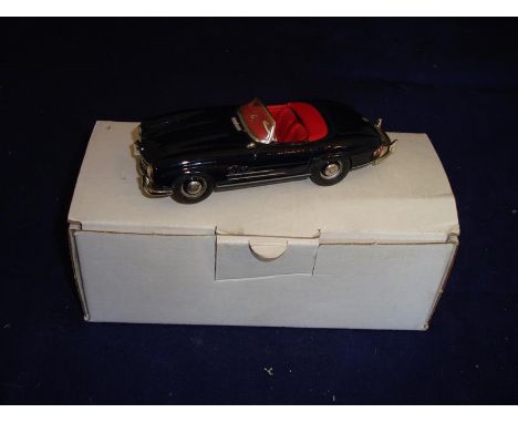 An SMTS white metal 1:43 Scale Mercedes 300SL in black. E in G-VG box.