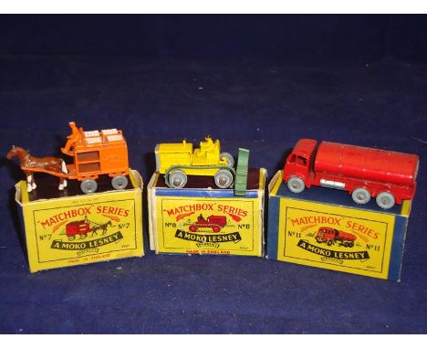 A group of boxed Matchbox original series 1-75 models:  A No 7 Hrse Drawn Milk Float. A No 8 Caterpillar Tractor (Tracks A/F)