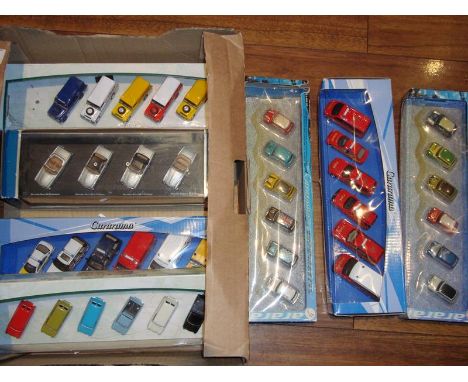 A tray of boxed 1:76 scale (00 Gauge) multi vehicle sets by Carorama.  VG in F-G boxes. (one set missing one vehicle) (7 sets