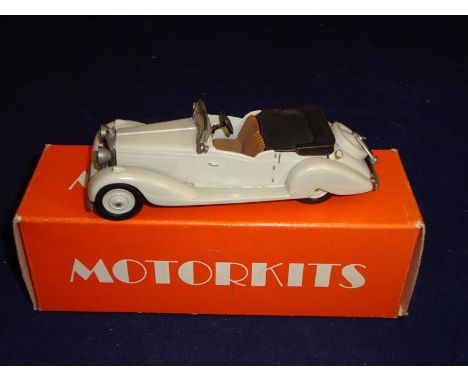 A Motorkits 1:43 Scale 1939 Bentley 4.5 litre Vanden Pla Tourer, in cream. G in G box.