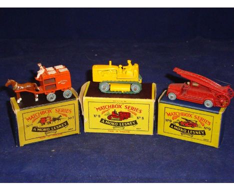 A group of boxed Matchbox original series 1-75 models: A No 7 Horse Drawn Milk Float, a No 8 Caterpillar Tractor and a No 9 D