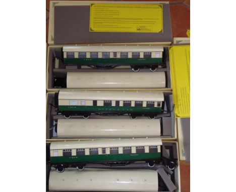 An ACE trains O Gauge articulated East Coast Tourist / Excursion Coach Set, comprising six coaches in three boxes.  VG-E in V