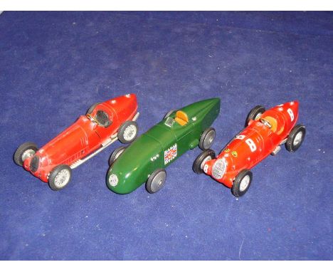 A group of three white metal Racing Cars 1:43, by various manufacturers to include an MG Magic Midget. Unboxed. G