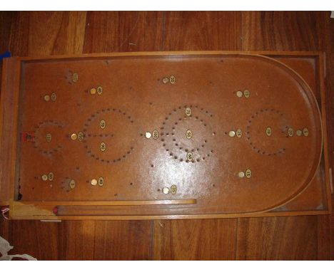 A Chad Valley Bagatelle game circa 1950s/60s complete with marbles.  One or two pins missing.  Generally G.