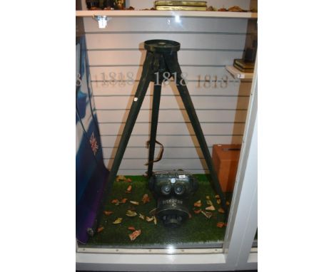 An unusual set of green painted Diskopar viewing binoculars and tripod stand
unable to acertain magnification details.