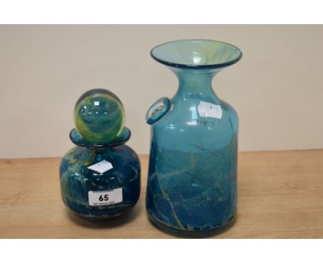 A Mdina style blue glass carafe or vase, with Maltese cross decoration, measuring 21cm tall, and a glass bottle with stopper,