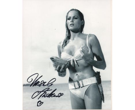 Ursula Andress signed James Bond 10x8 black and white photo affixed to card. Ursula Andress (born 19 March 1936)  is a Swiss 