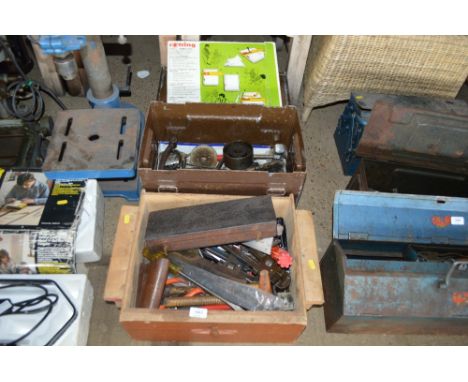 An ammo tin and a storage box of various hand tools